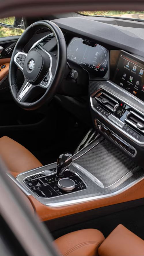 BMW X5 M Sport interior with cognac leather and digital cockpit